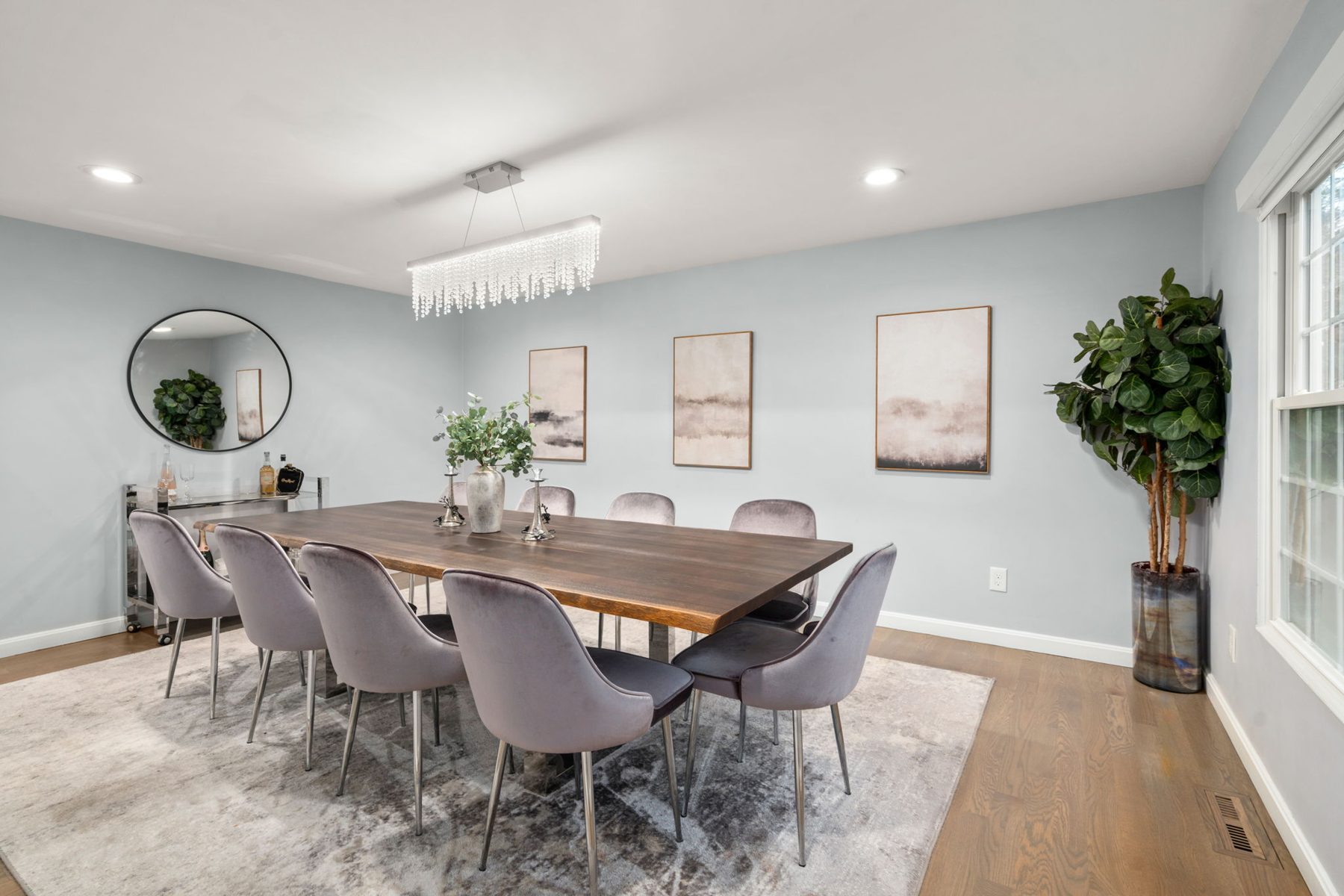 Condor dining — a table for ten and a crystal bar light — after