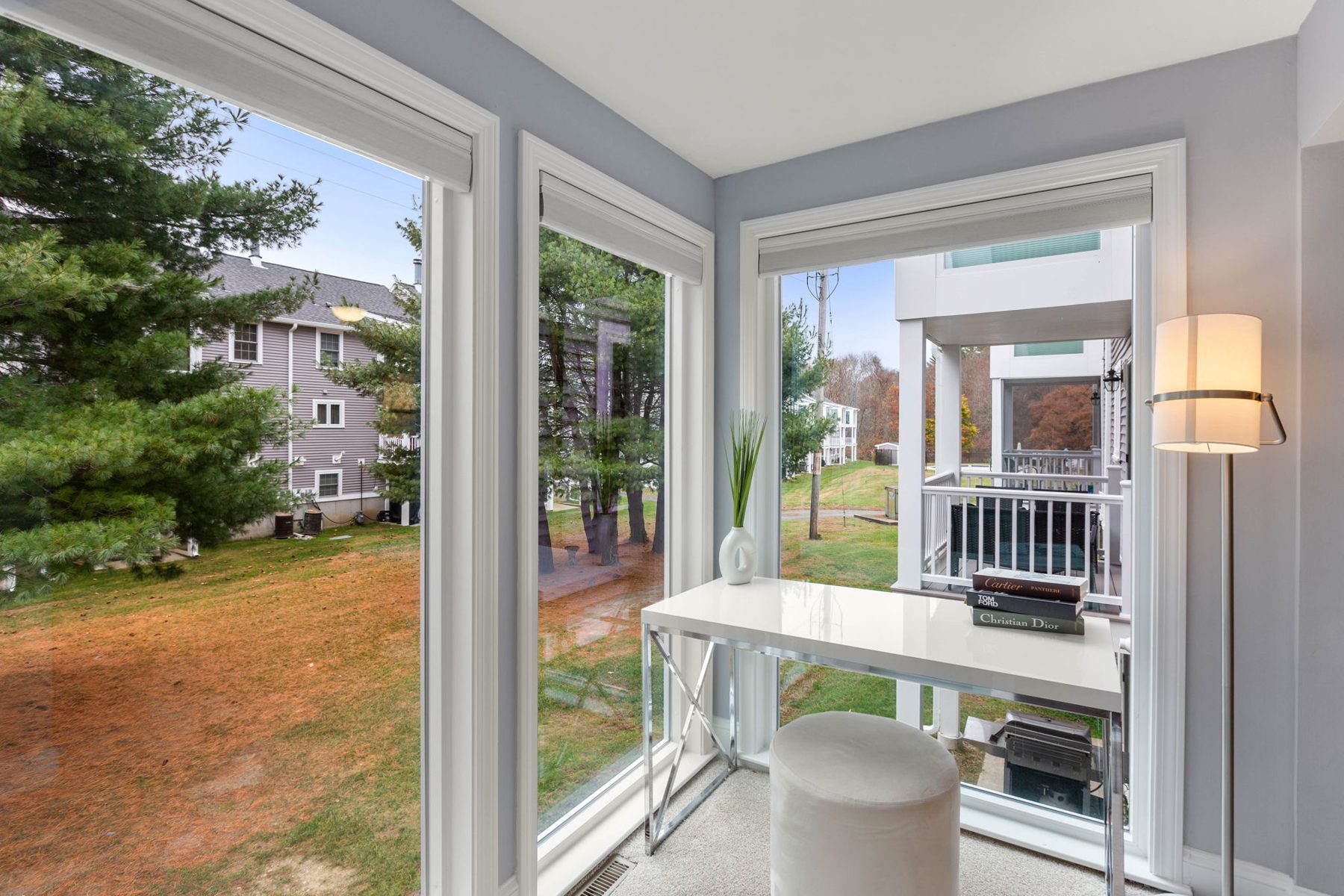 Foundry sunroom — a three-window corner turned into the office every buyer was looking for — after