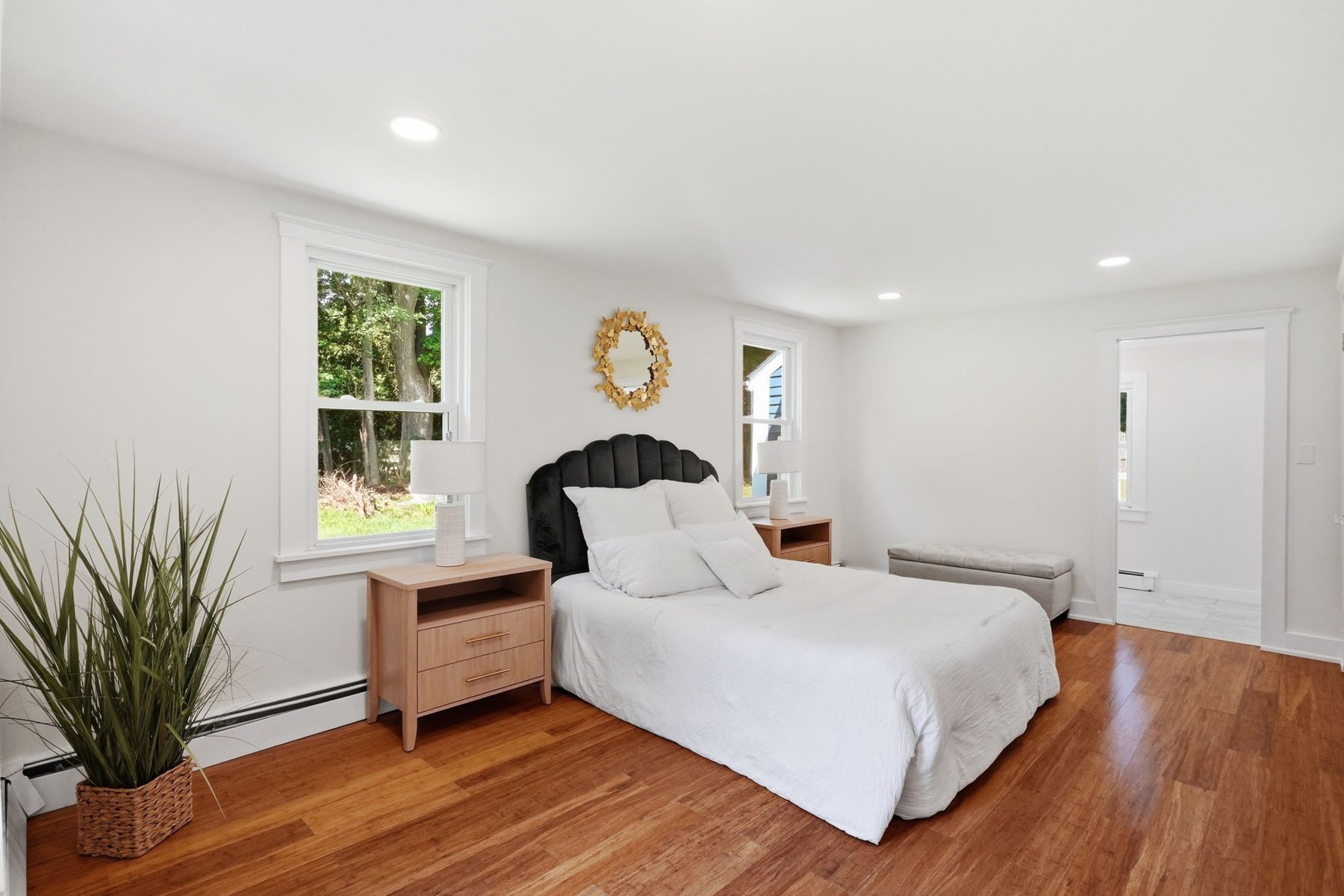 Pemberton bedroom black — black scalloped headboard — after