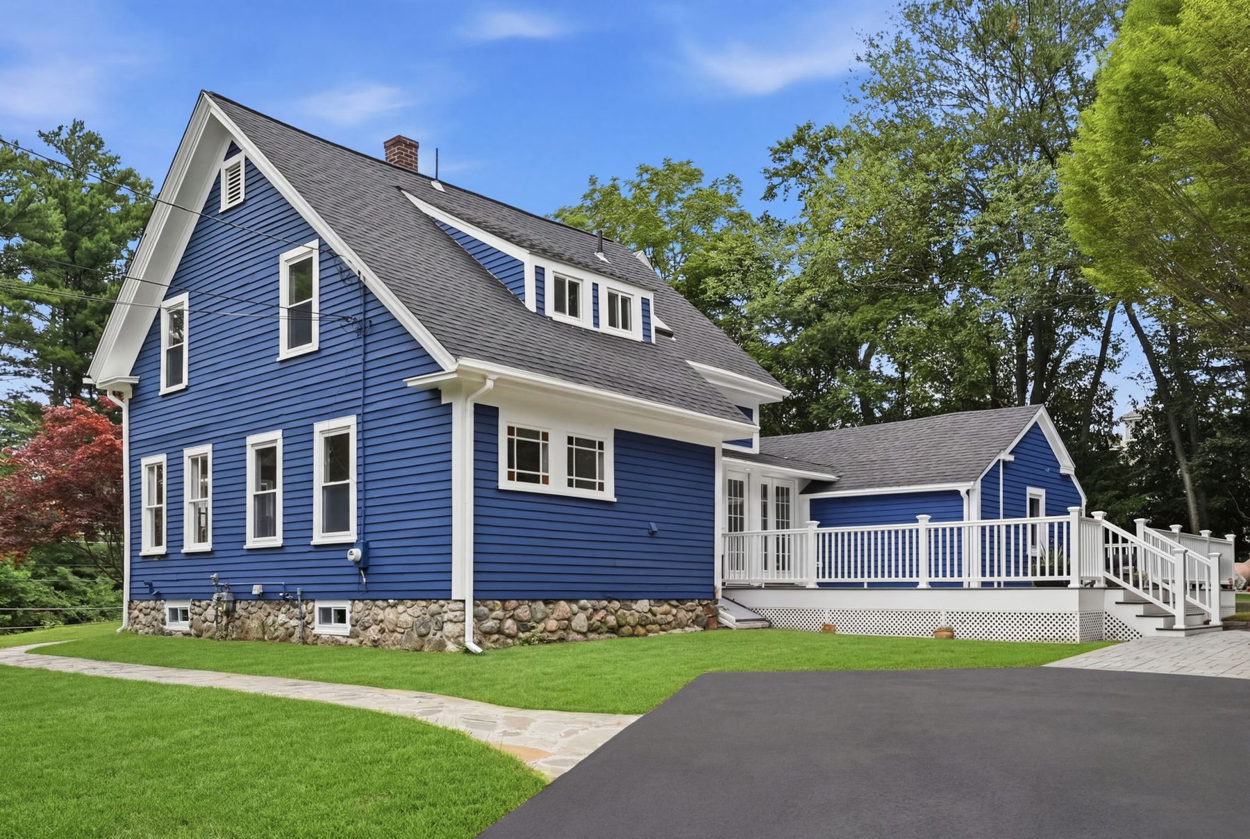 Pemberton exterior — blue Victorian, new deck, June — after