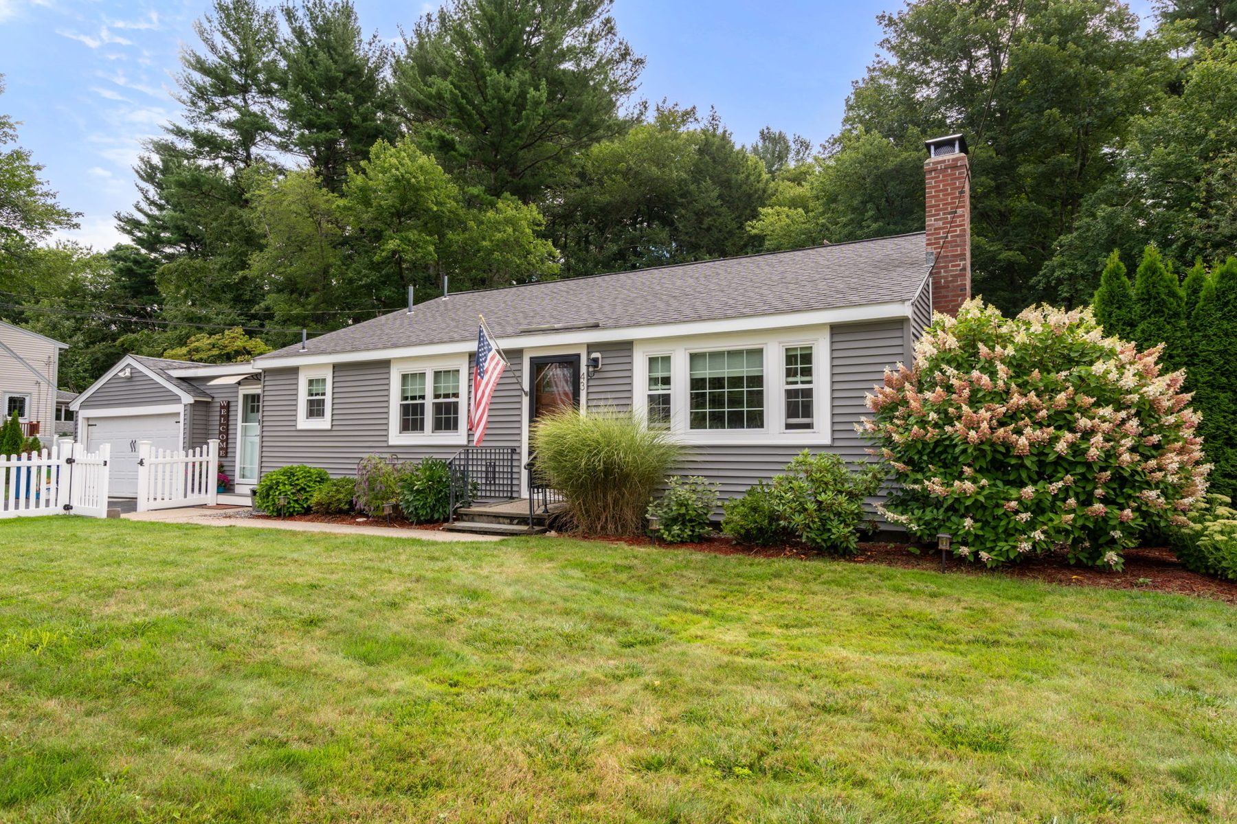 Skelton exterior — the ranch from the street — after