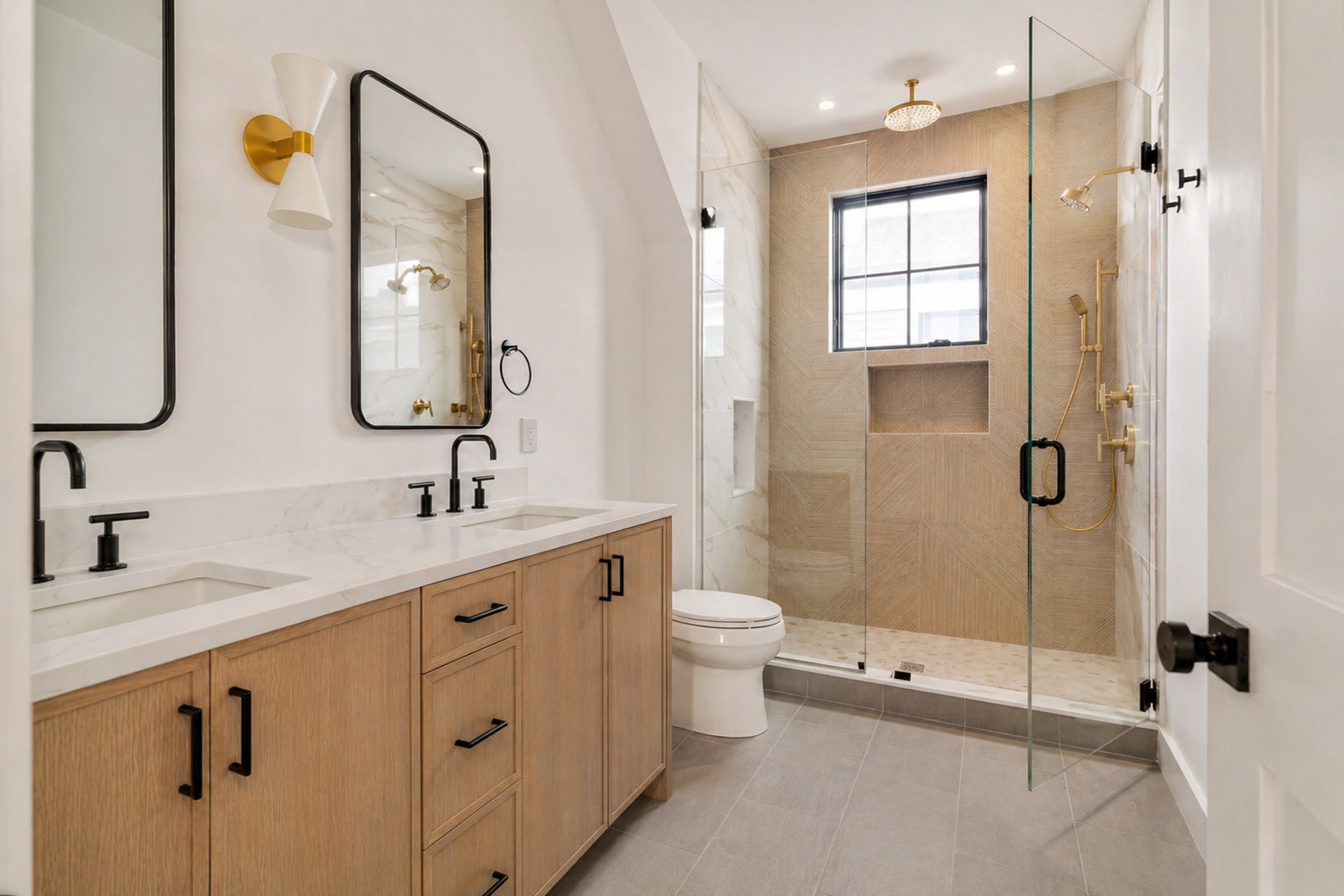 Waverly bath — arched mirror, white oak vanity, glass shower — after