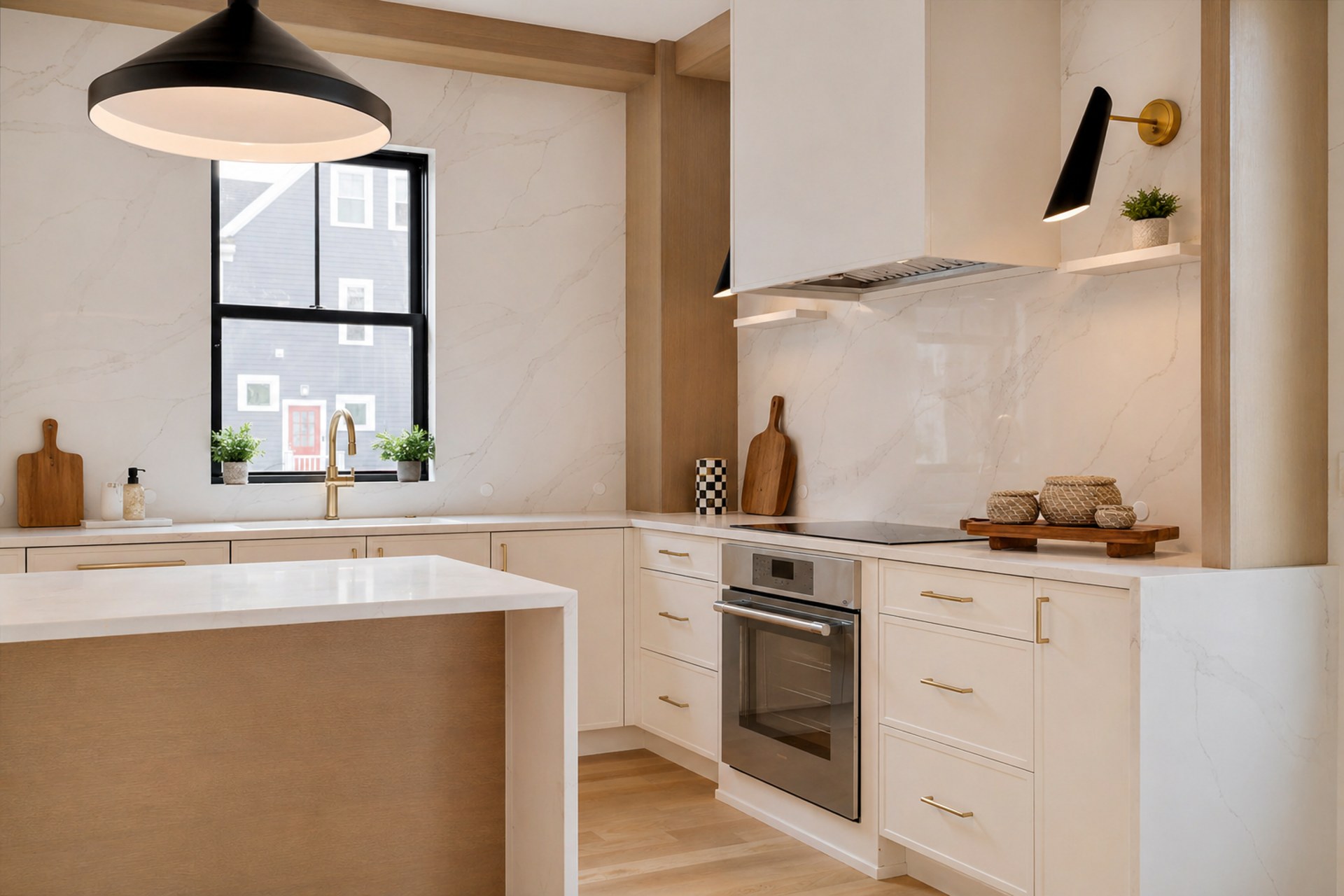 Waverly kitchen — white oak, quartz, and a black pendant that earns its spot — after