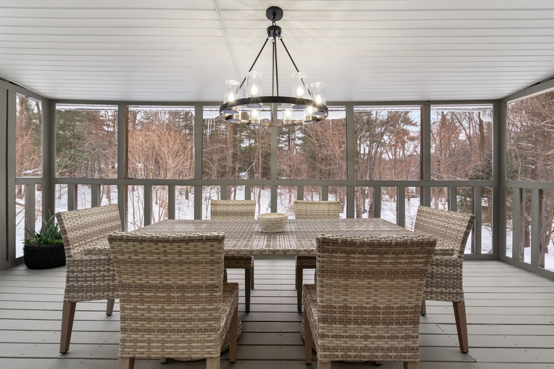 Wilshire porch — screened, wired, furnished for eight — after